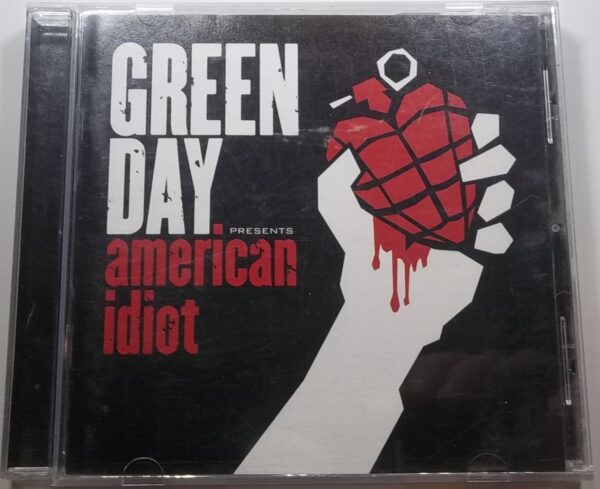 CD Cover with band name, and a white hand holding a red grenade